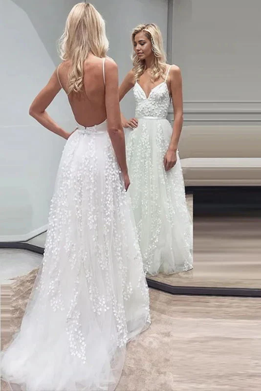 Hermoso vestido de novia con tirantes finos, escote en V y espalda abierta
